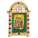 Radha Krishna on Stone Studded and Golden Carved Metal Frame - Table top Picture