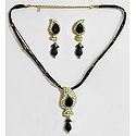 Black Corded Necklace with White and Black Stone Studded Pendant and Earrings