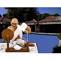 Mahatma Gandhi Spinning Charkha - Unframed Photo Print on Paper