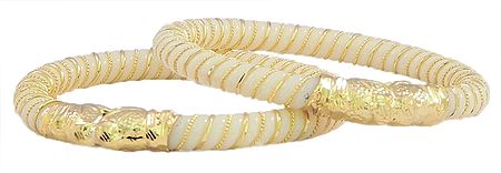 Pair of Gold Plated Off-White Acrylic Shankha