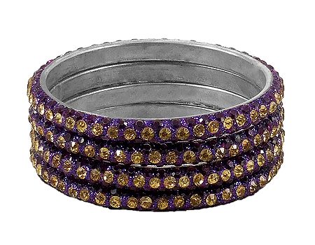4 Purple and Golden Stone Studded Metal Bangles