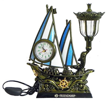 Battery Operated Table Clock in a Acrylic Sailing Ship with Lamp