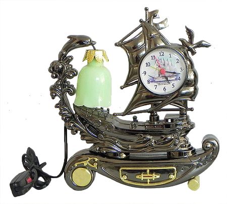 Battery Operated Table Clock in a Plastic Sailing Ship with Lamp