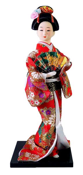 Japanese Doll in Red Kimono Dress Holding Flute