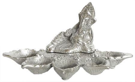 Reclining Ganesha with Five Ghee or Oil Lamps