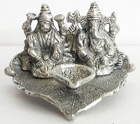 Ghee or Oil Lamp with Lakshmi and Ganesha on Leaf