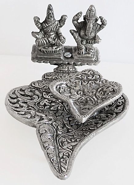 Oil Lamp on a Conch with Ganesha and Lakshmi