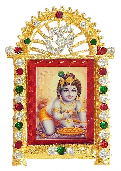 Krishna on Stone Studded and Golden Carved Metal Frame - Table Top Picture