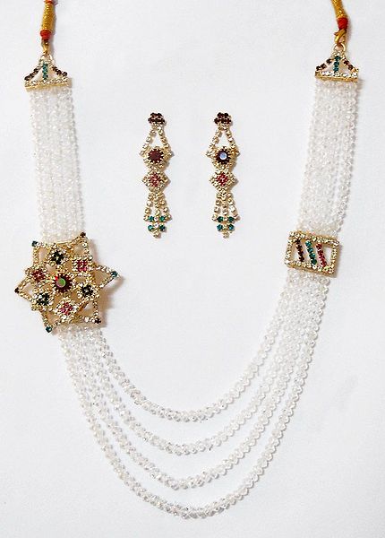 Four Layer White Crystal Necklace with Stone Studded Side Pendant and Earrings