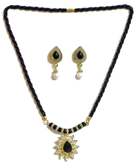 Black Bead Necklace with Stone Studded Pendant and Earrings