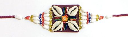 Multicolor Beaded Armlet with Cowrie on Maroon Cloth