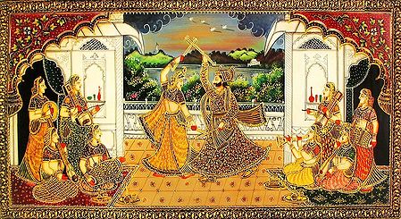 King and the Queen Playing Dandiya Raas