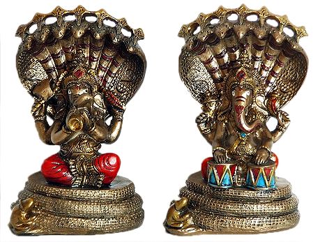 A Pair of Musician Ganesha Sitting Under Serpent Hood