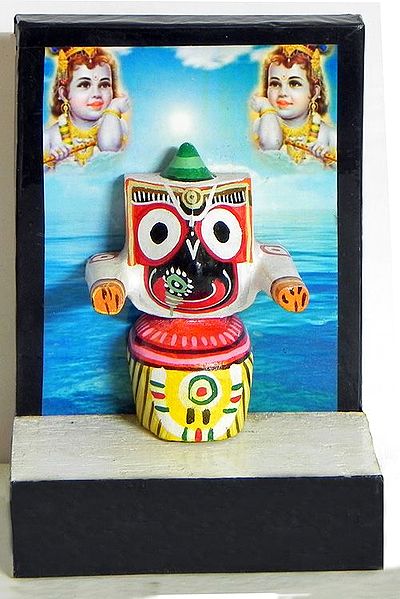 Jagannathdev with Two Krishna Photo and Sea as Backdrop