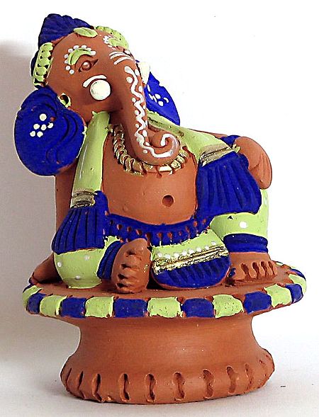 Lord Ganesha Sitting on a Stool