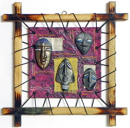 Masks of Four Tribals on a Handmade Paper Background - Wall Hanging