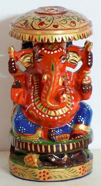 Decorated Saffron Ganesha Sitting Under Umbrella