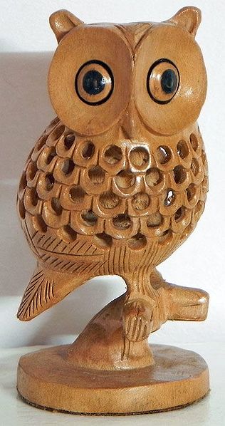 Intricately Wood Carved Owl Within Owl