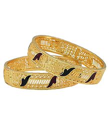 Pair of Lacquered Gold Plated Bangles
