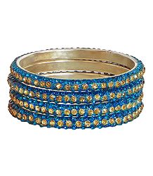 4 Cyan with Golden Stone Studded Metal Bangles