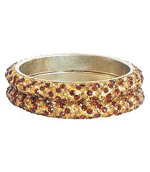 Pair of Golden and Red Stone Studded Bangles