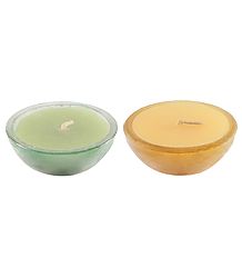 Perfumed Candles Placed inside Glass Bowls