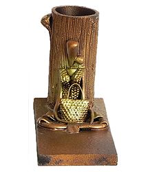 Resin Tribal Lady with Basket in Front of Wooden Flower Vase 