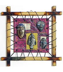 Masks of Four Tribals on a Handmade Paper Background - Wall Hanging