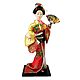 Japanese Geisha Doll in Red with Yellow Kimono Dress Holding Fan